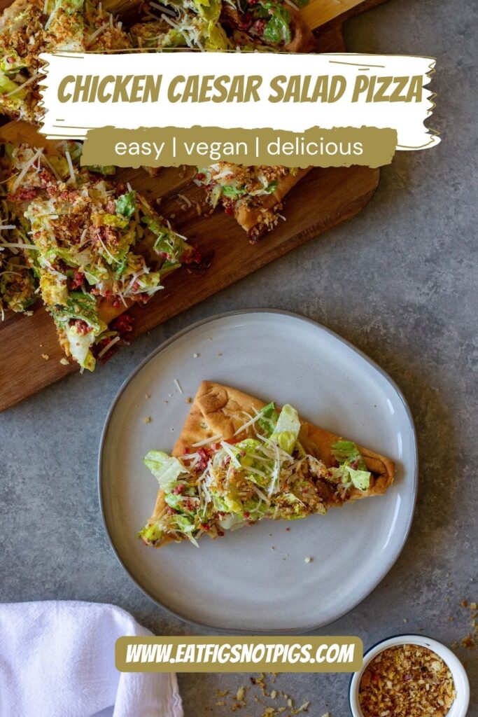 Sliced Vegan Chicken Caesar Salad Pizza served on a wooden board with a side of lemony breadcrumbs