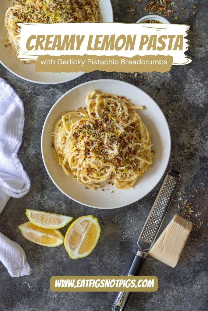 Cooked pasta coated in creamy lemon sauce with homemade garlicky pistachio breadcrumbs.