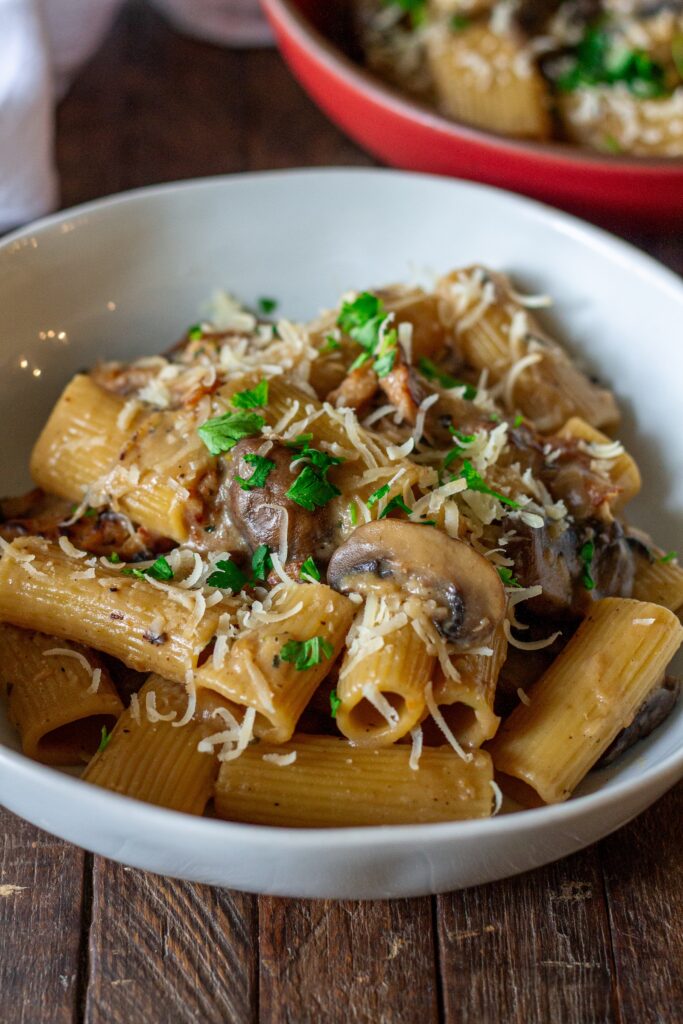 Close-up of creamy mushroom marsala pasta garnished with fresh parsley