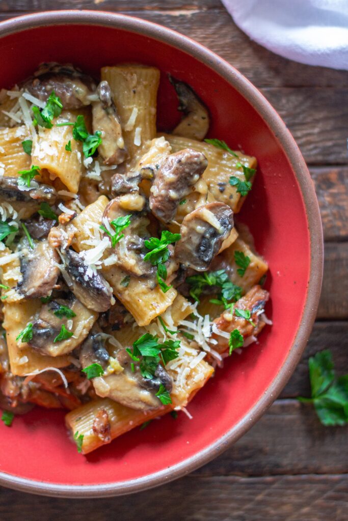Close-up of creamy mushroom marsala pasta garnished with fresh parsley